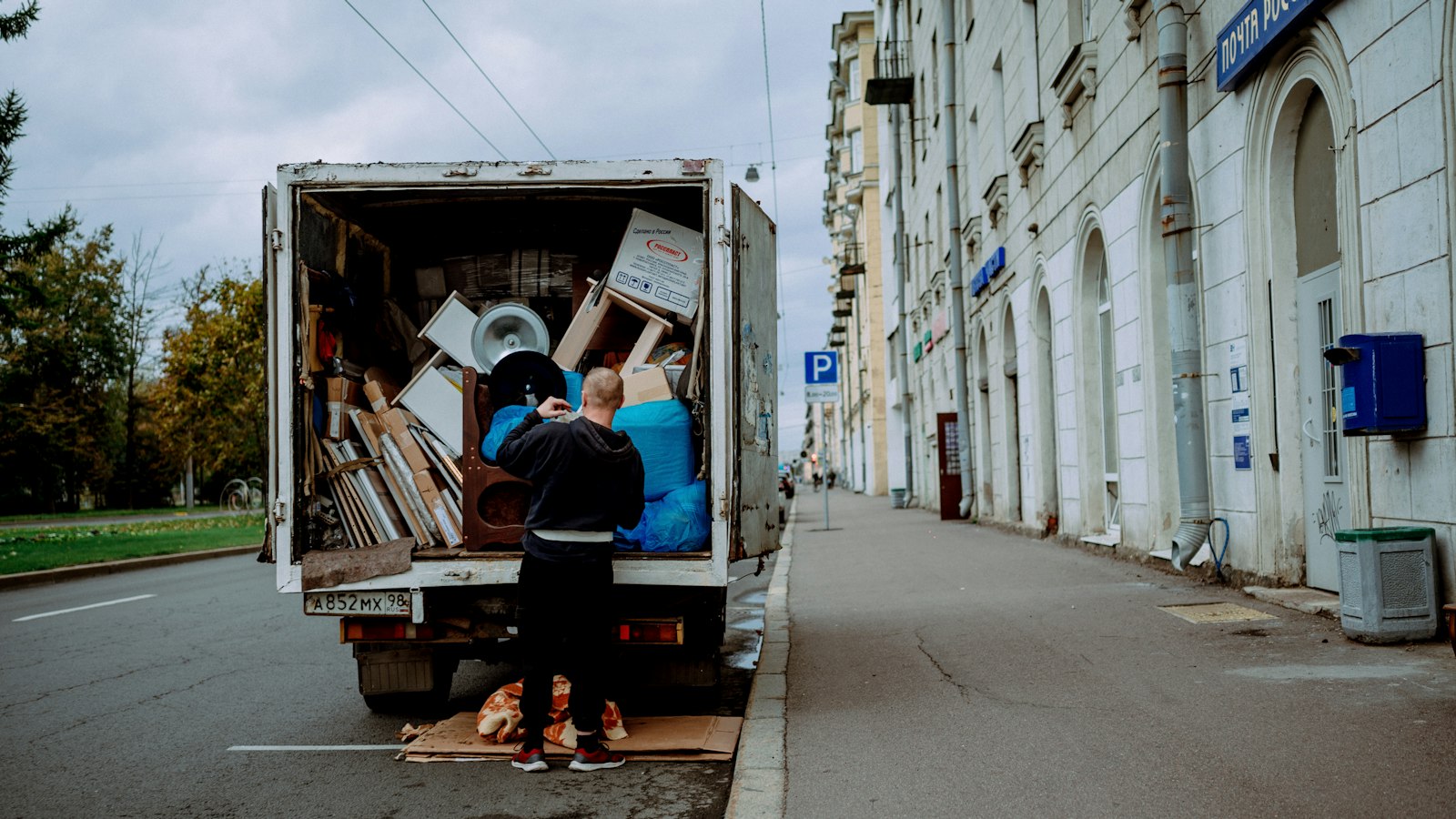 Moving truck being loaded on a city street